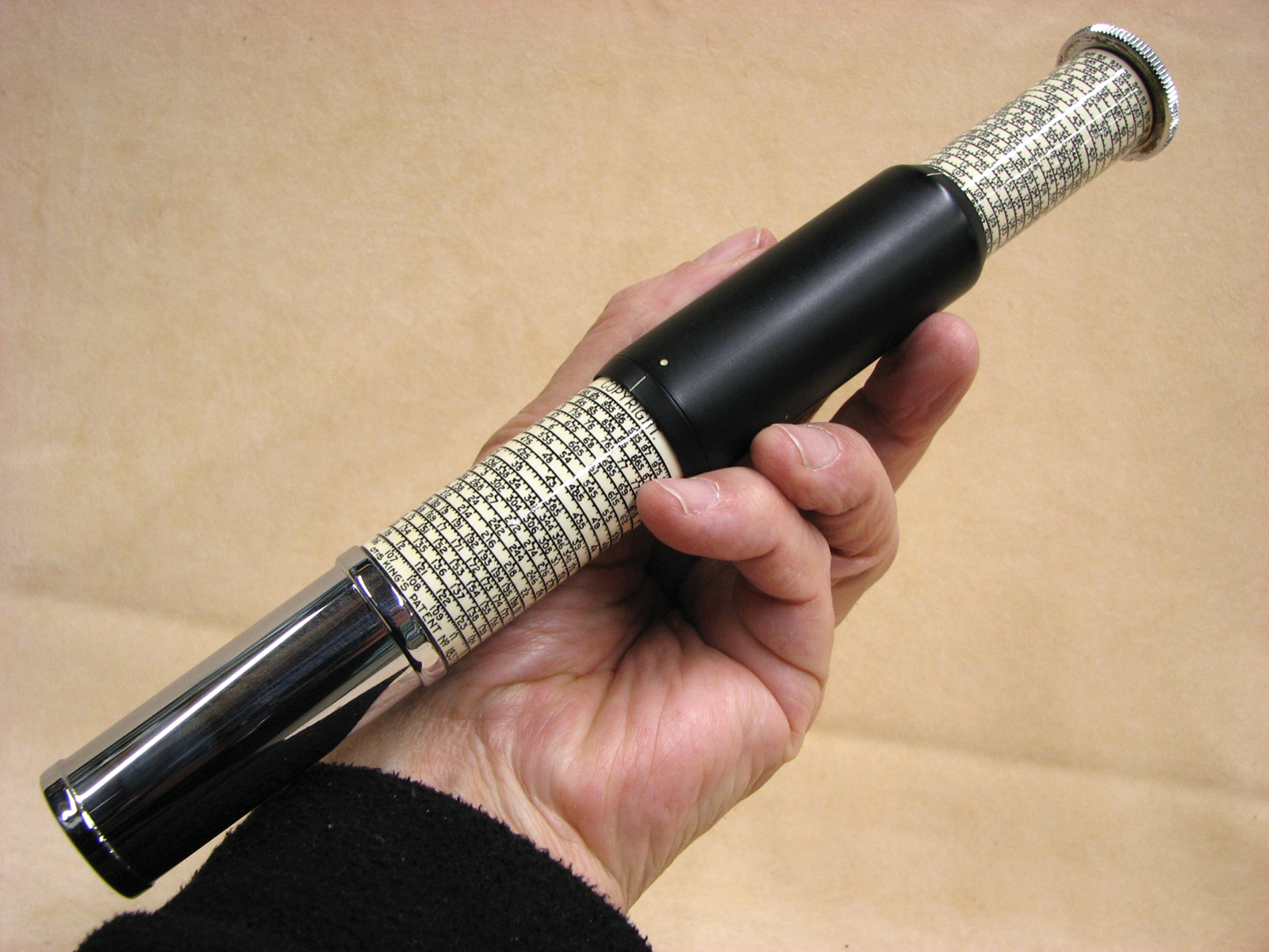 Early 1970's Otis King Model K type C leather cased cylindrical slide rule calculator